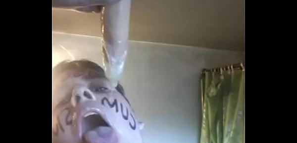  Faggot dripping with loads of cum from a condom